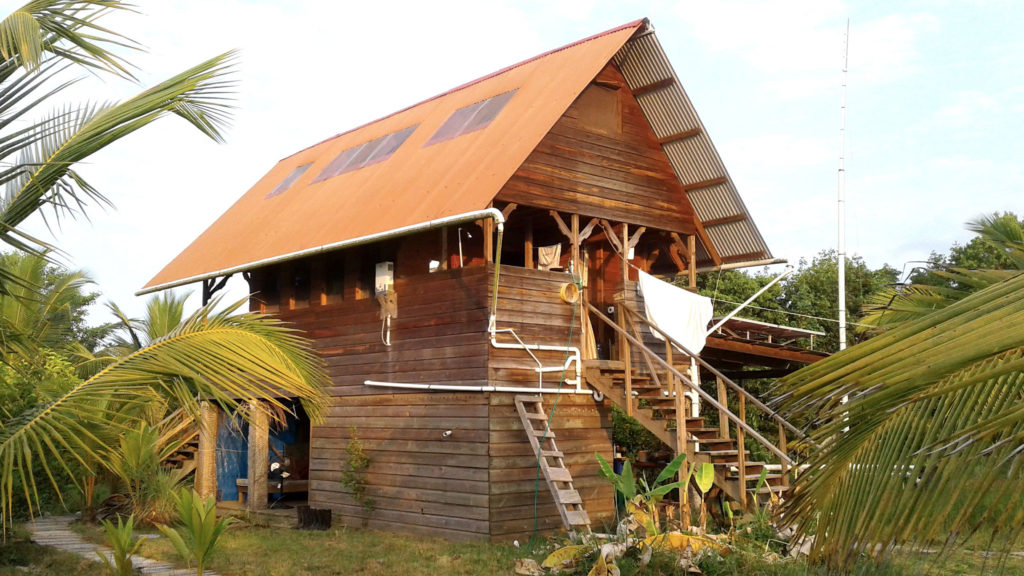 Tropical Wooden Off-Grid Cabin Solar Power Metal Roof